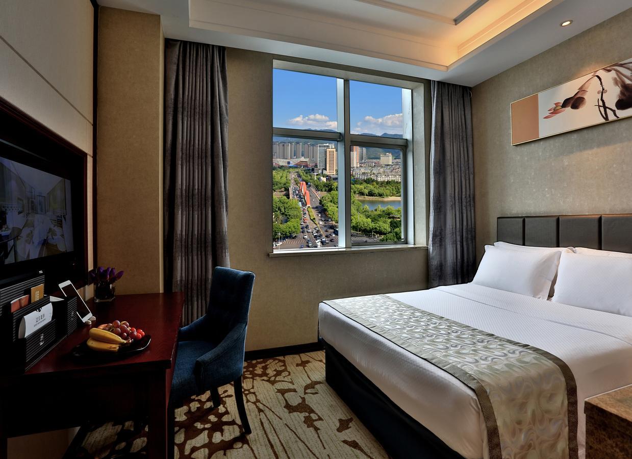 Yiwu Zhong Lian Kai Xin Hotel Екстериор снимка